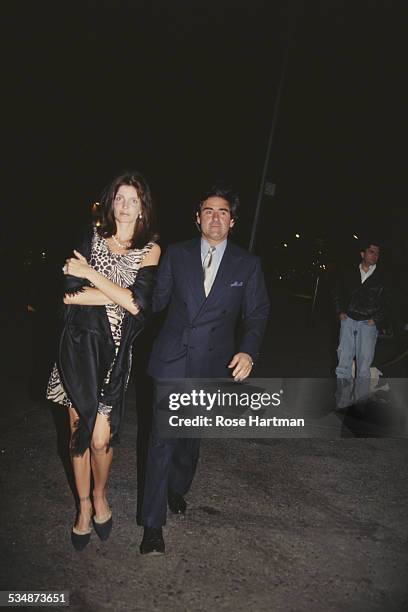 American model and actress Stephanie Seymour and her husband, American industrialist and businessman Peter M. Brant, attending a party for Dennis...