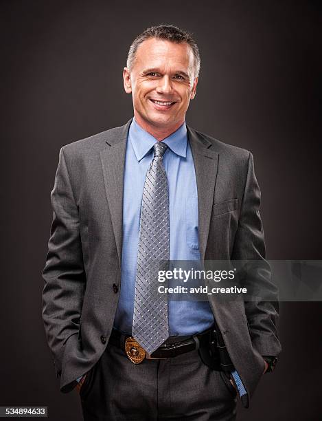 happy police detective - male police officer stock pictures, royalty-free photos & images