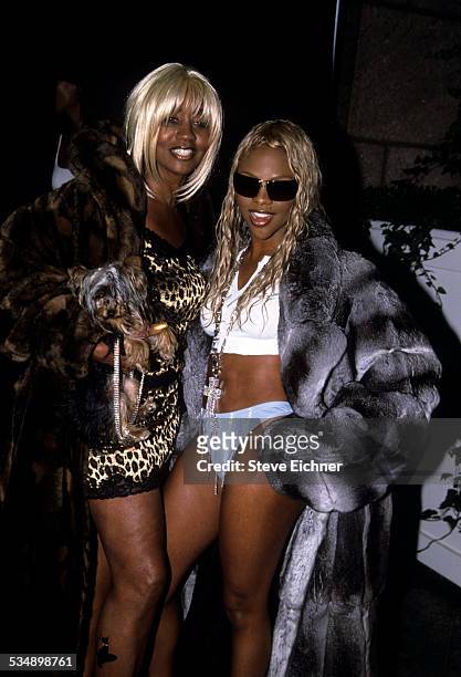 Janice Combs and Lil' Kim at Baby Phat Fashion Show, New York, August 3, 2000.