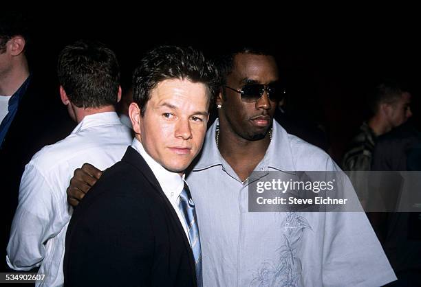 Mark Wahlberg and Sean Combs Puffy Pdiddy at premiere of 'Planet of the Apes,' New York, July 23, 2001.