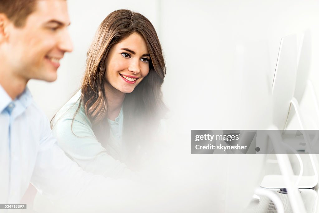 Business colleagues at a computer class.