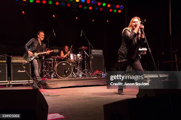 Musicians Andrew Freeman, Vivian Campbell, and Vinny Appice of Last In Line performs at Catch The Fever Festival Grounds on May 27, 2016 in Pryor,...