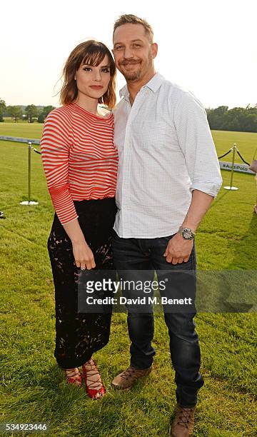 Charlotte Riley and Tom Hardy attend day one of the Audi Polo Challenge at Coworth Park on May 28, 2016 in London, England.