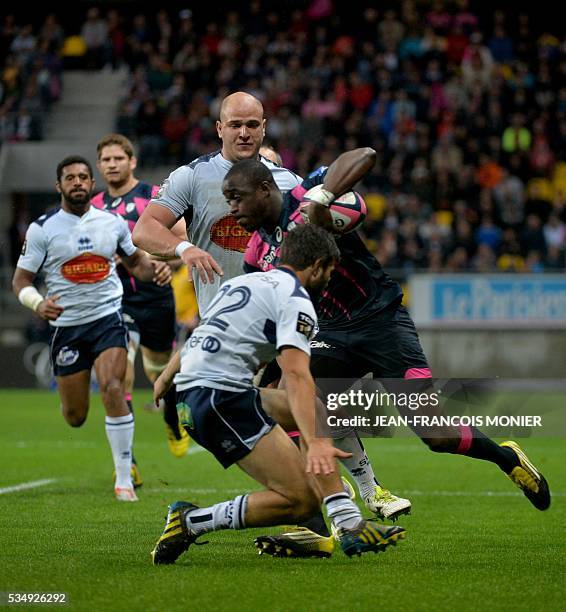 Stade Francais Paris' French fullback Djibril Camara runs with the ball during the French Top 14 rugby union match between Agen and Stade Français on...