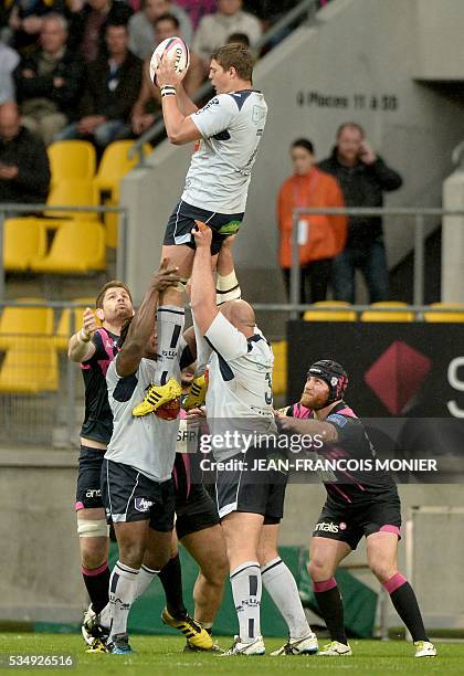 Agen's Georgian wing Tamaz Mchedlidze catches the ball during the French Top 14 rugby union match between Agen and Stade Français on May 28, 2016 at...