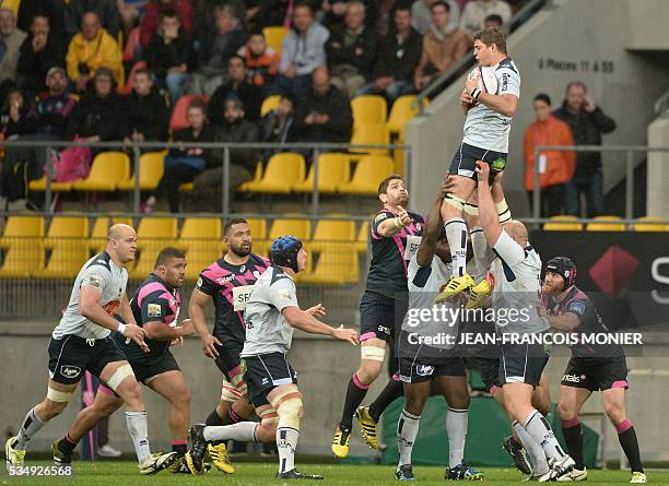 Agen's Georgian wing Tamaz Mchedlidze catches the ball during the French Top 14 rugby union match between Agen and Stade Français on May 28, 2016 at...