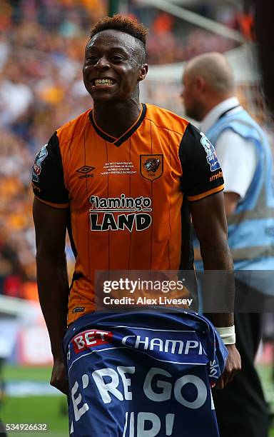 Moses Odubajo of Hull City celebrates his team's win and promotion to the Premier League after Sky Bet Championship Play Off Final match between Hull...