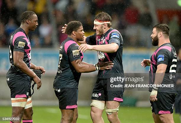 Stade Francais Paris' French scrumhalf Julien Dupuy, French prop Rabah Slimani, French flanker Matthieu Ugena, and French hooker Laurent Sempere...