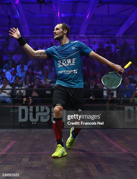 Gregory Gaultier of France celebrates a point during the men's final match of the PSA Dubai World Series Finals 2016 at Burj Park on May 28, 2016 in...