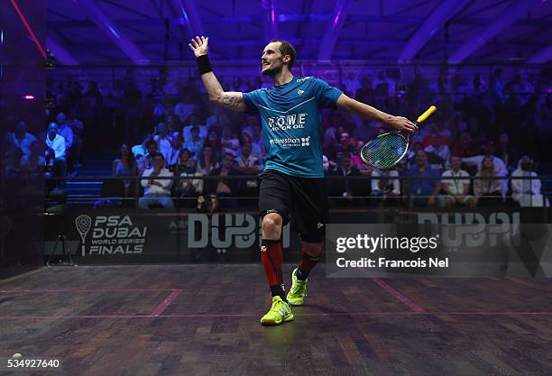 Gregory Gaultier of France celebrates a point during the men's final match of the PSA Dubai World Series Finals 2016 at Burj Park on May 28, 2016 in...