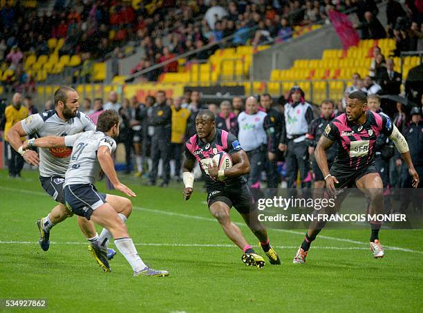 Stade Francais Paris' South African prop Heinke van der Merwe runs with the ball during the French Top 14 rugby union match between Agen and Stade...