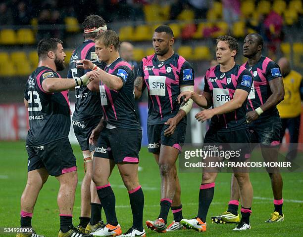 Stade Francais' celebrate after winning the French Top 14 rugby union match between Agen and Stade Français on May 28, 2016 at the MMArena Stadium in...