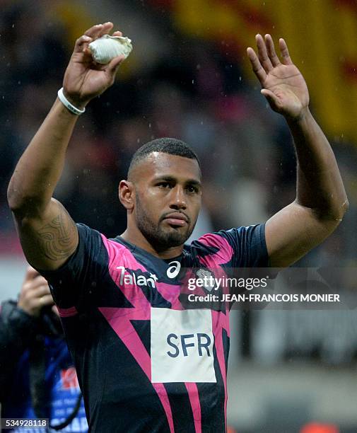 Stade Francais Paris' Fijian wing Waisea waves after the French Top 14 rugby union match between Agen and Stade Français on May 28, 2016 at the...