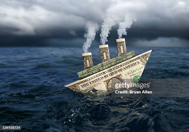 us dollar as a sinking ship - sinking foto e immagini stock