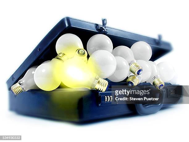 briefcase full of light bulbs - 天才 ストックフォトと画像
