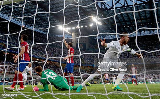 Sergio Ramos of Real Madrid celebrates after scoring the opening goal during the UEFA Champions League Final match between Real Madrid and Club...