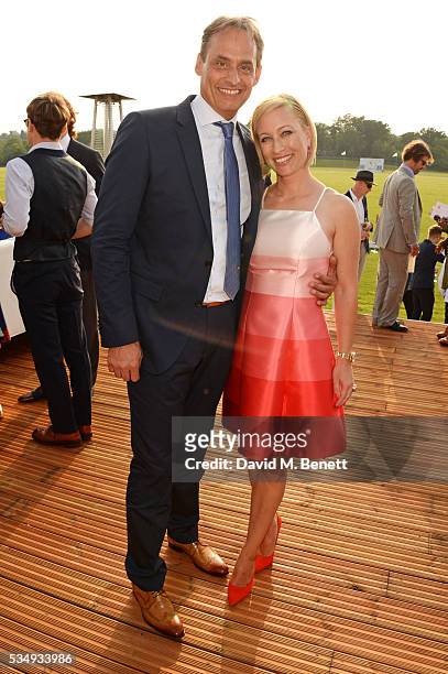 Andre Konsbruck, Director of Audi UK, and Christine Sieg attend day one of the Audi Polo Challenge at Coworth Park on May 28, 2016 in London, England.