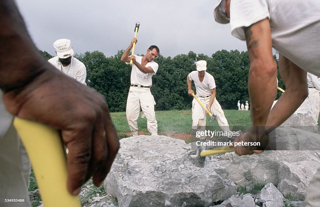 Prrisoner Breaking Rocks Inmates From The Limestone Correctional Facility On A Chain Gang. The ...
