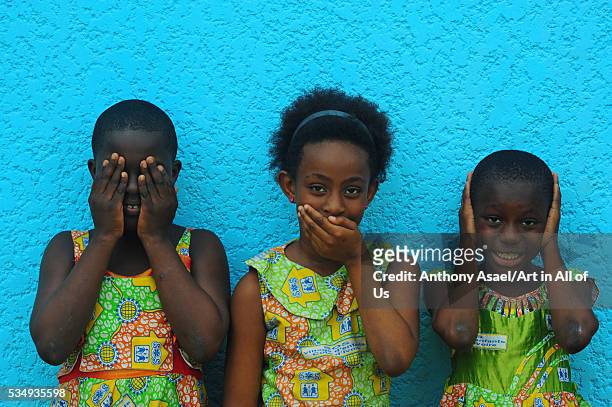 Cote d'Ivoire, Abidjan, SOS Children Village, 3 schoolgirls playing deaf, blind, silent