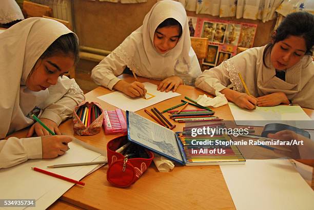 Iran, Tehran, children drawing in class during Art in All of Us activities