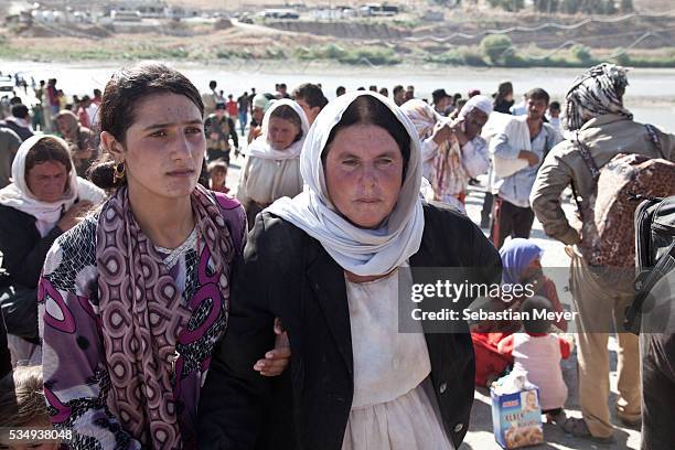 Tens of thousdans of Yezidi cross from Syria back into Iraq. Tens of thousands of Yezidi--an minority ethno-religious group in Iraq--have made there...