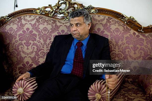 Businessman attends an evening presentation at a businessmen's club in Baghdad. 10 years after the US led invasion, Iraq continues to suffer from...