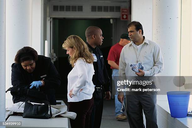 Bag Search Process Bag Search Security Photos and Premium High Res Pictures - Getty Images