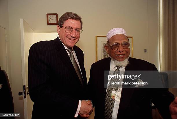 Richard Holbrooke meets with acting United Nations Security Council President and Bangladesh's Foreign Minister Abdus Samad Azad to discuss peace...