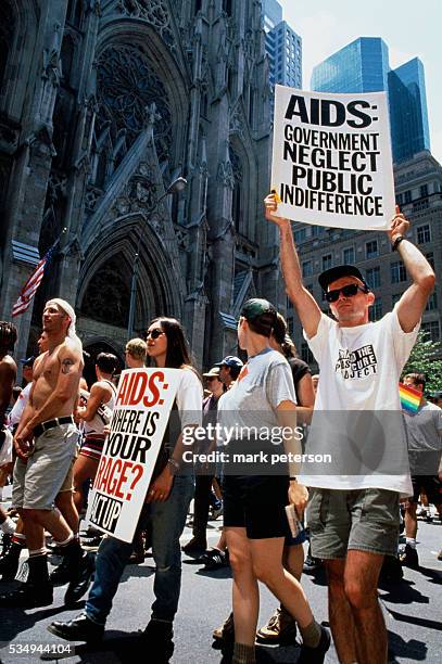 Crowd of ACT UP activists march in front of St. Patrick's Cathedral during the twenty-fifth anniversary celebration of the Stonewall Uprising. On...