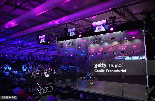 Gregory Gaultier of France competes against Cameron Pilley of Australia during the men's final match of the PSA Dubai World Series Finals 2016 at...