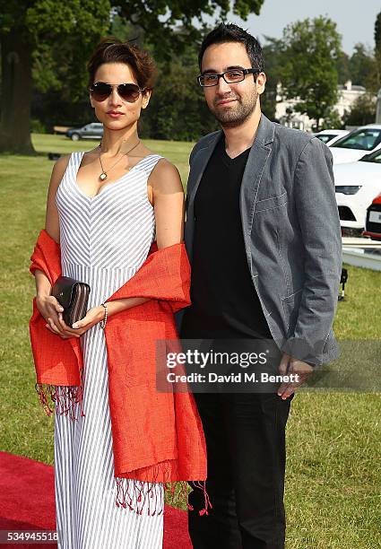 Amber Rose Revah and guest attend day one of the Audi Polo Challenge at Coworth Park on May 28, 2016 in London, England.