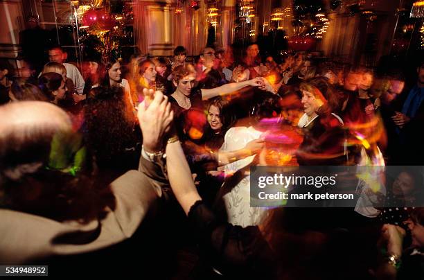 Friends and family dance and celebrate at a bat mitzvah celebration for 13-year-old Ali Green. The reception takes place at a ballroom on Manhattan's...