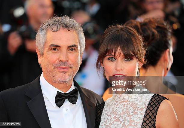 Alfonso Cuaron and Sheherazade Goldsmith attend 'Gravity' Premiere and Opening Ceremony during the 70th Venice International Film Festival