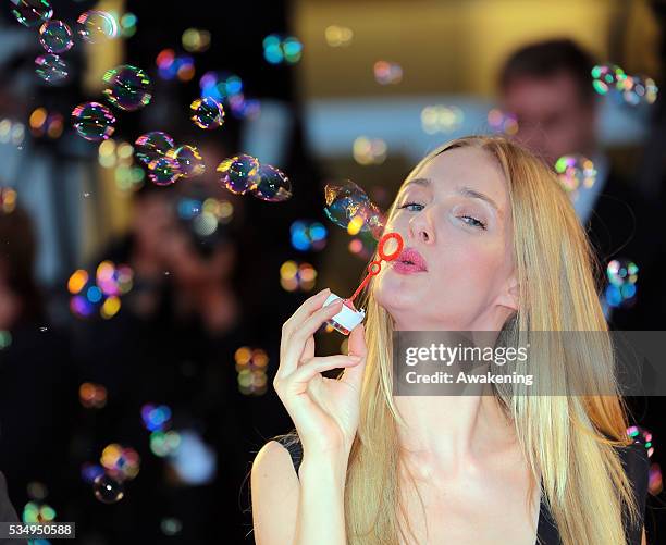 Eva Riccobono blow bubbles during the 'Tracks' Premiere during the 70th Venice International Film Festival
