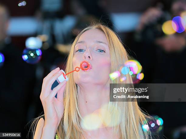 Eva Riccobono blow bubbles during the 'Tracks' Premiere during the 70th Venice International Film Festival