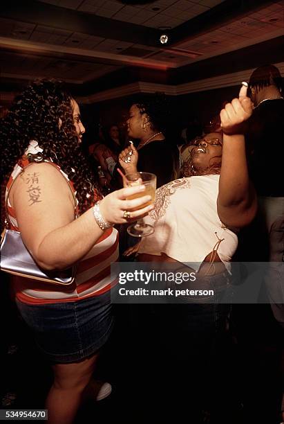 Women dancing at Goddesses Party, a party for big beautiful men and women and their admirers in NYC, NY.