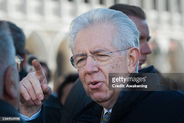 Italy's outgoing Prime Minister Mario Monti on a private visit with his family to Venice and Saint Mark's Square