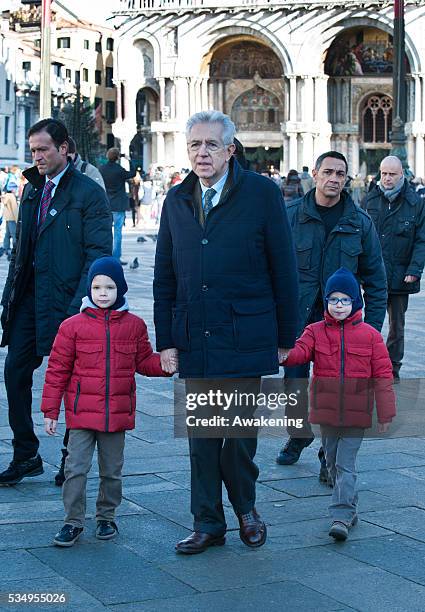 Italy's outgoing Prime Minister Mario Monti on a private visit with his family to Venice and Saint Mark's Square