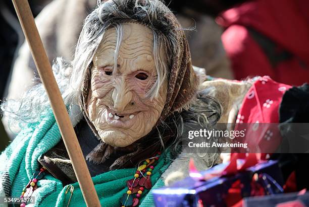 One of the costumed participants races along the Grand Canal for the 'Befana' Regatta on January 6, 2014 in Venice, Italy. In Italian folklore,...