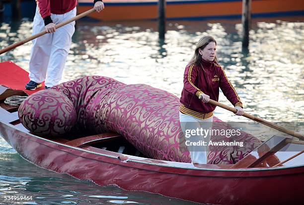 Costumed participants races along the Grand Canal for the 'Befana' Regatta on January 6, 2014 in Venice, Italy. In Italian folklore, Befana is an old...