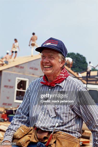 Jimmy Carter at a construction site for Habitat for Humanity. The former President of the United States and his wife lead the Jimmy Carter Work...