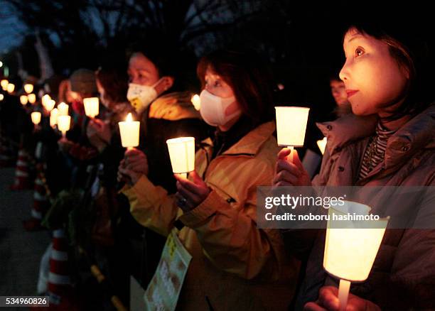 March 11/2012/Noboru Hashimoto/Tokyo/Japan/ The first anniversary of the Great East Japan earthquake on March 11,2012. Japanese protesters muurns for...