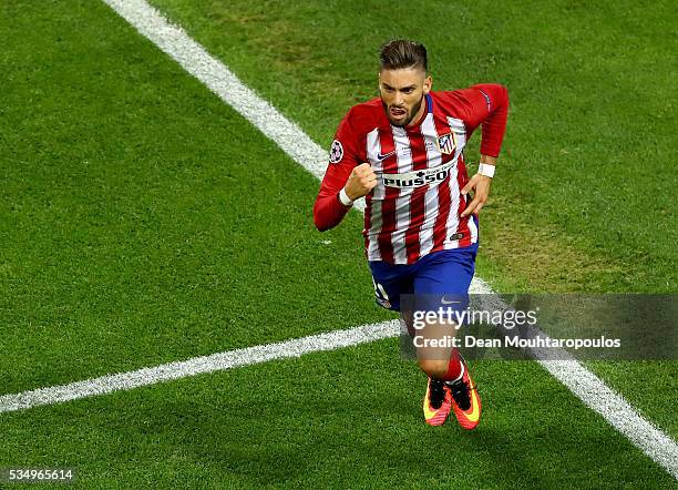 Yannick Carrasco of Atletico Madrid celebrates after scoring the equalising goal during the UEFA Champions League Final match between Real Madrid and...