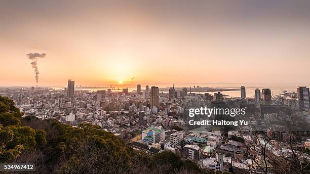 high angle view of kobe, japan during morning twilight - kobe japan stock-fotos und bilder