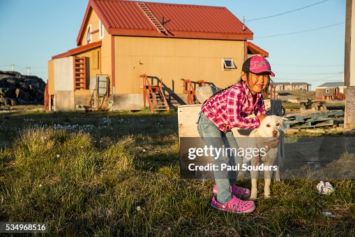 Girl and Sled Dog, Whale Cove, Hudson Bay, Nunavut, Canada