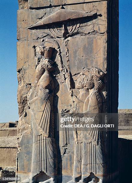 Emperor Darius I followed by two servants, relief from a door of the Trypilon Palace of Persepolis , Iran. Achaemenid civilisation, 6th-5th century...