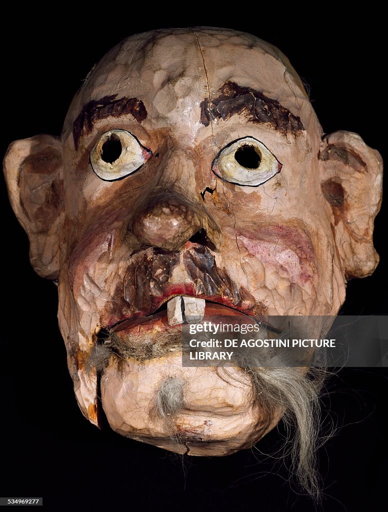 Wooden mask for performances of popular plays...