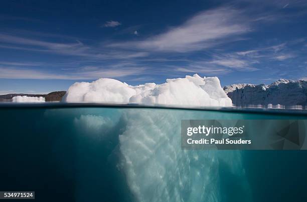iceberg underwater in ililussat - underwater iceberg stock-fotos und bilder