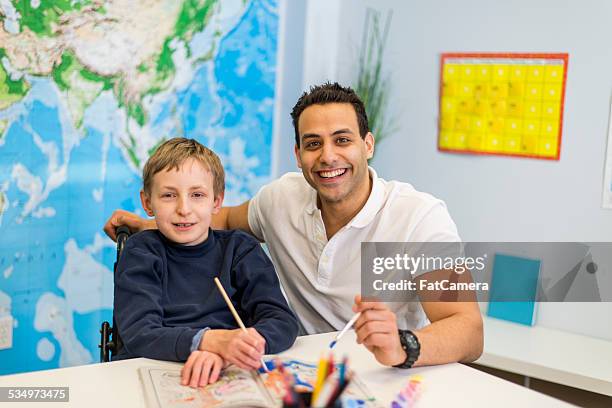 boy with developmental disability - social work drawing stock pictures, royalty-free photos & images
