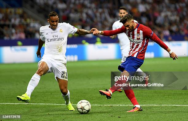 Yannick Carrasco of Atletico Madrid is challenged by Danilo of Real Madrid during the UEFA Champions League Final match between Real Madrid and Club...